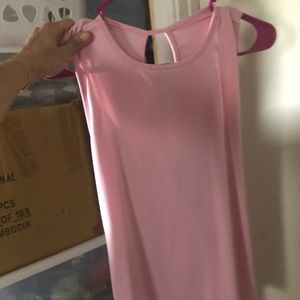 Women’s bright pink open backed tank top blouse